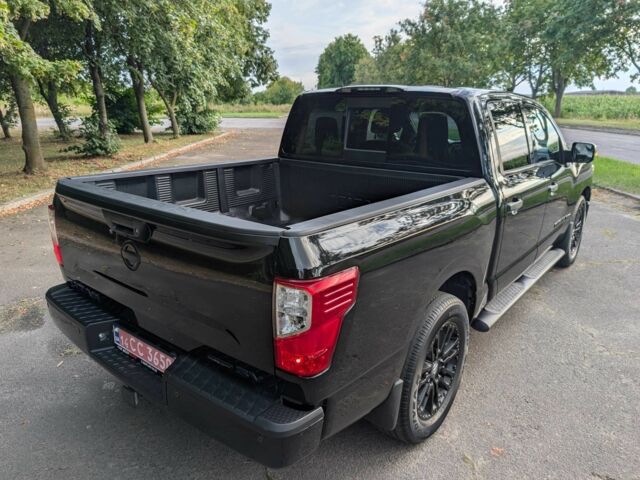 Черный Ниссан Титан, объемом двигателя 5.6 л и пробегом 160 тыс. км за 26999 $, фото 16 на Automoto.ua