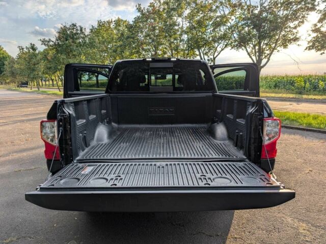 Черный Ниссан Титан, объемом двигателя 5.6 л и пробегом 160 тыс. км за 26999 $, фото 21 на Automoto.ua