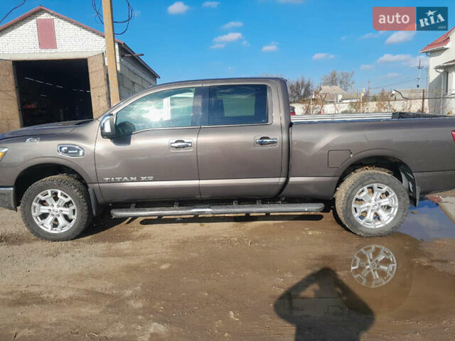 Коричневый Ниссан Титан, объемом двигателя 0 л и пробегом 150 тыс. км за 16500 $, фото 1 на Automoto.ua