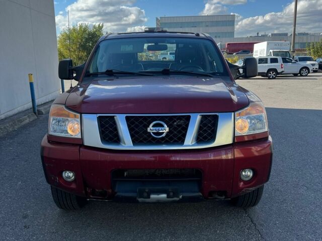 Красный Ниссан Титан, объемом двигателя 5.6 л и пробегом 270 тыс. км за 8500 $, фото 8 на Automoto.ua
