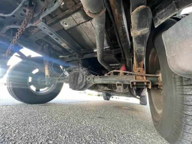 Красный Ниссан Титан, объемом двигателя 5.6 л и пробегом 270 тыс. км за 8500 $, фото 10 на Automoto.ua