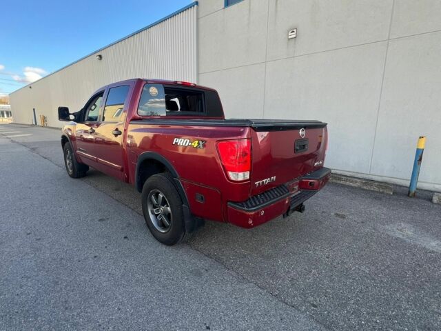 Красный Ниссан Титан, объемом двигателя 5.6 л и пробегом 270 тыс. км за 8500 $, фото 9 на Automoto.ua