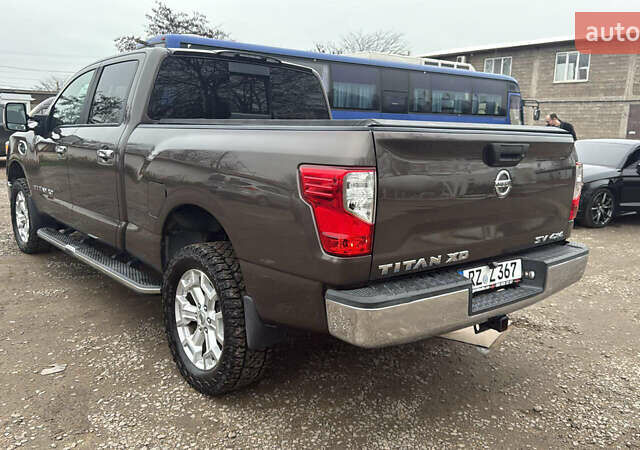Серый Ниссан Титан, объемом двигателя 4.98 л и пробегом 161 тыс. км за 41500 $, фото 14 на Automoto.ua