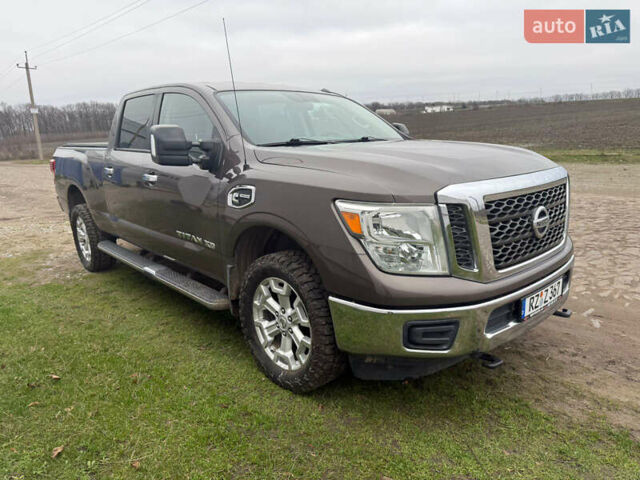Серый Ниссан Титан, объемом двигателя 4.98 л и пробегом 161 тыс. км за 41500 $, фото 5 на Automoto.ua