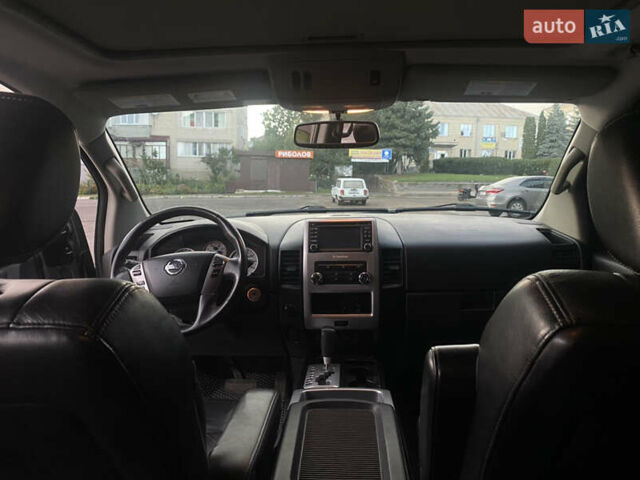 Серый Ниссан Титан, объемом двигателя 5.55 л и пробегом 143 тыс. км за 19500 $, фото 3 на Automoto.ua