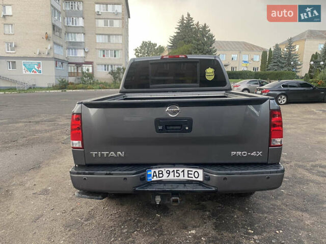 Серый Ниссан Титан, объемом двигателя 5.55 л и пробегом 143 тыс. км за 19500 $, фото 6 на Automoto.ua