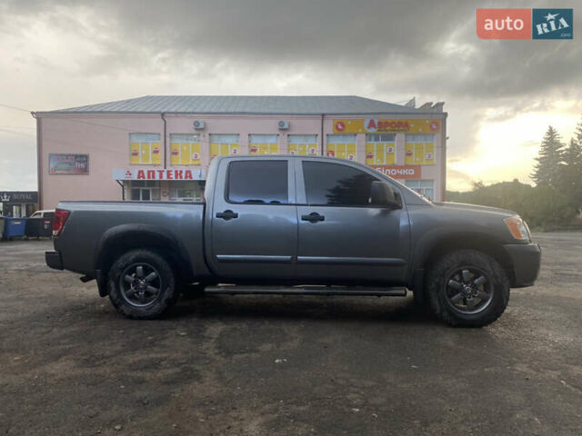 Серый Ниссан Титан, объемом двигателя 5.55 л и пробегом 143 тыс. км за 19500 $, фото 2 на Automoto.ua