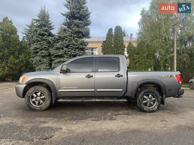 Серый Ниссан Титан, объемом двигателя 5.55 л и пробегом 143 тыс. км за 19500 $, фото 5 на Automoto.ua