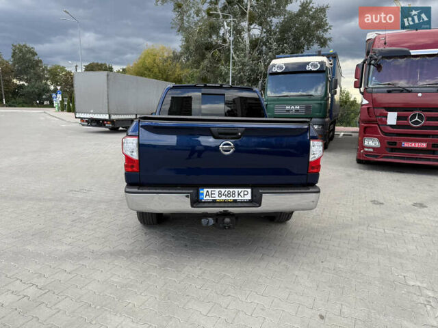 Синий Ниссан Титан, объемом двигателя 5.56 л и пробегом 145 тыс. км за 29500 $, фото 1 на Automoto.ua