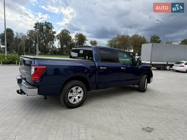 Синий Ниссан Титан, объемом двигателя 5.56 л и пробегом 145 тыс. км за 29500 $, фото 4 на Automoto.ua