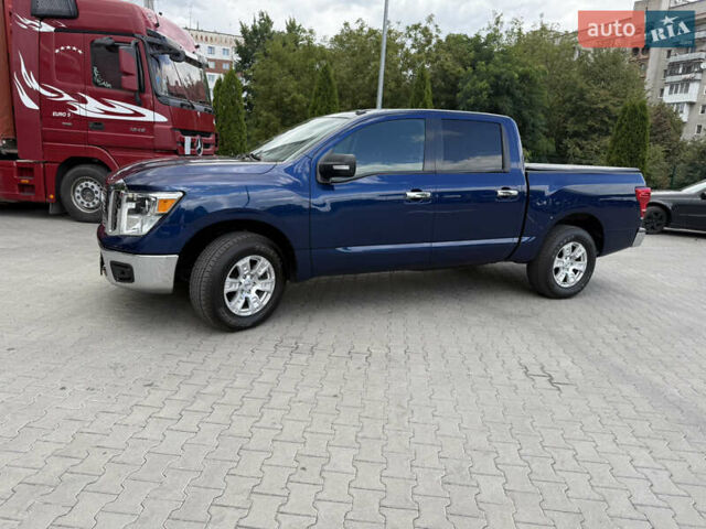 Синий Ниссан Титан, объемом двигателя 5.56 л и пробегом 145 тыс. км за 29500 $, фото 2 на Automoto.ua