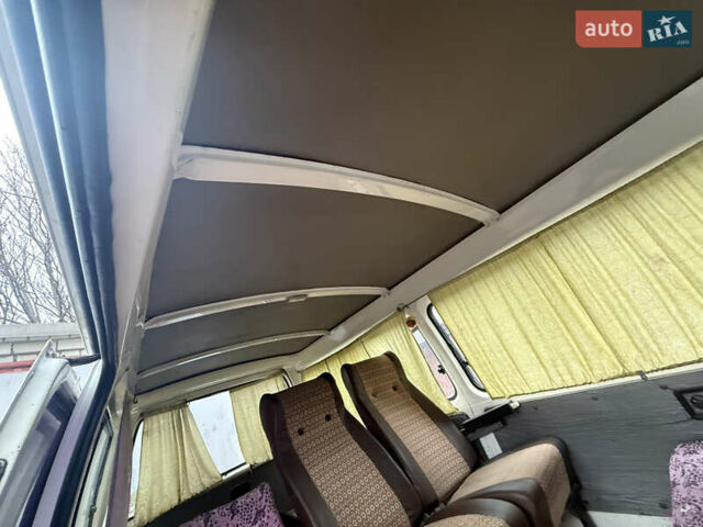 Белый Ниссан Урван, объемом двигателя 2.49 л и пробегом 330 тыс. км за 2800 $, фото 4 на Automoto.ua