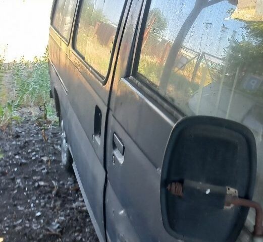 Синій Ніссан Урван, об'ємом двигуна 2.3 л та пробігом 300 тис. км за 387 $, фото 4 на Automoto.ua