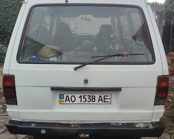 Белый Ниссан Ванетте, объемом двигателя 2 л и пробегом 216 тыс. км за 2100 $, фото 3 на Automoto.ua