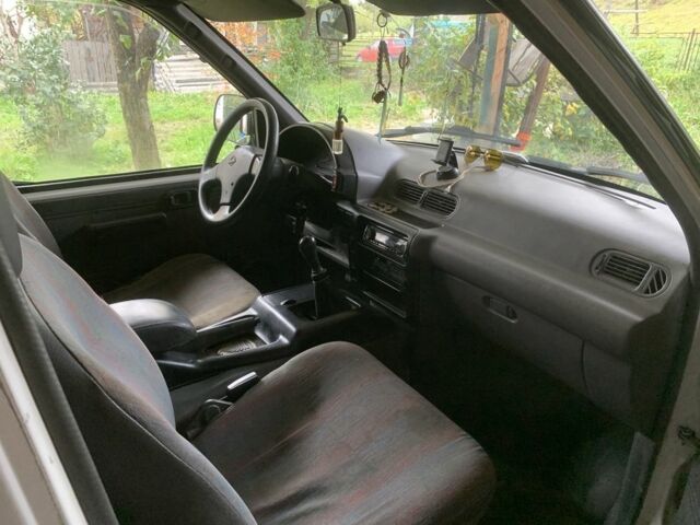 Білий Ніссан Ванетте, об'ємом двигуна 2.3 л та пробігом 320 тис. км за 2300 $, фото 3 на Automoto.ua