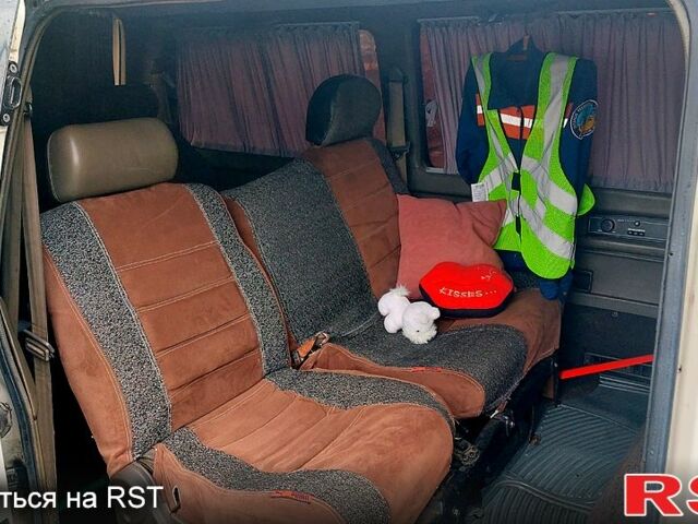 Белый Ниссан Ванетте, объемом двигателя 20 л и пробегом 398 тыс. км за 3300 $, фото 6 на Automoto.ua