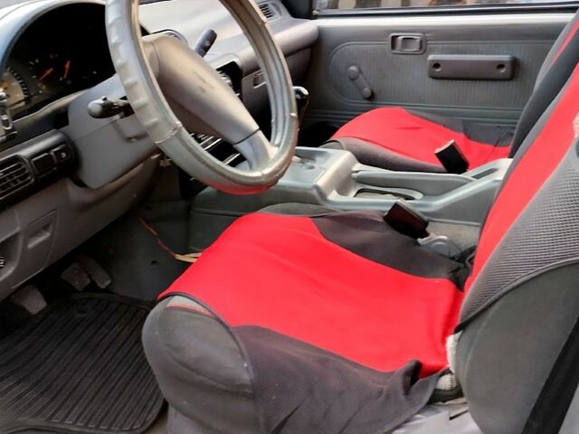 Белый Ниссан Ванетте, объемом двигателя 2.3 л и пробегом 266 тыс. км за 3200 $, фото 11 на Automoto.ua