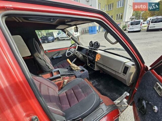 Красный Ниссан Ванетте, объемом двигателя 1.95 л и пробегом 237 тыс. км за 1800 $, фото 4 на Automoto.ua