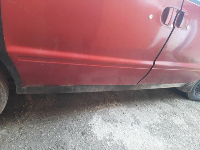 Красный Ниссан Ванетте, объемом двигателя 2.3 л и пробегом 370 тыс. км за 1277 $, фото 8 на Automoto.ua