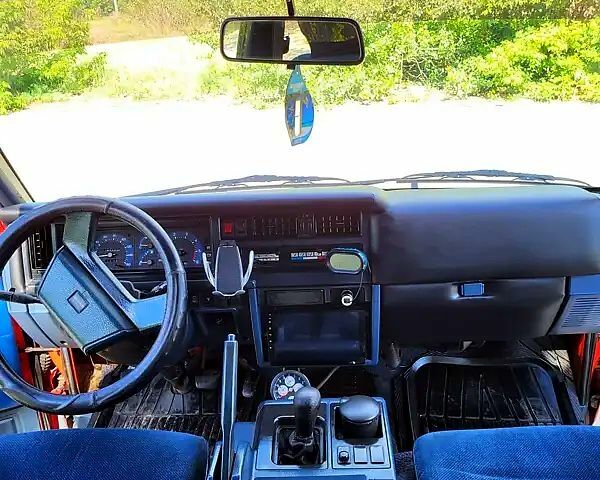 Червоний Ніссан Ванетте, об'ємом двигуна 2 л та пробігом 340 тис. км за 2500 $, фото 7 на Automoto.ua