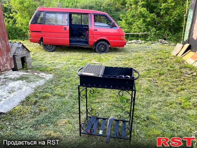 Червоний Ніссан Ванетте, об'ємом двигуна 2 л та пробігом 340 тис. км за 2500 $, фото 10 на Automoto.ua