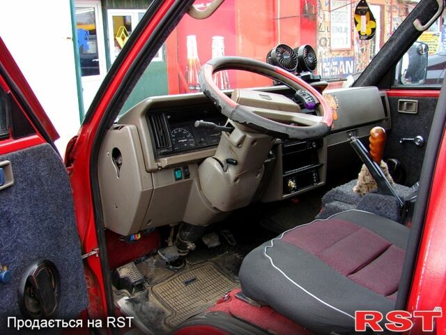 Красный Ниссан Ванетте, объемом двигателя 2 л и пробегом 275 тыс. км за 1200 $, фото 8 на Automoto.ua