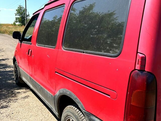 Красный Ниссан Ванетте, объемом двигателя 2.3 л и пробегом 300 тыс. км за 2100 $, фото 4 на Automoto.ua