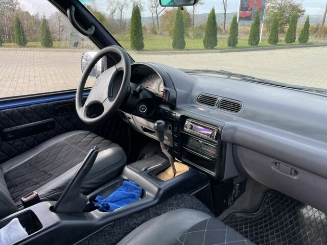 Синий Ниссан Ванетте, объемом двигателя 2.2 л и пробегом 300 тыс. км за 2850 $, фото 5 на Automoto.ua