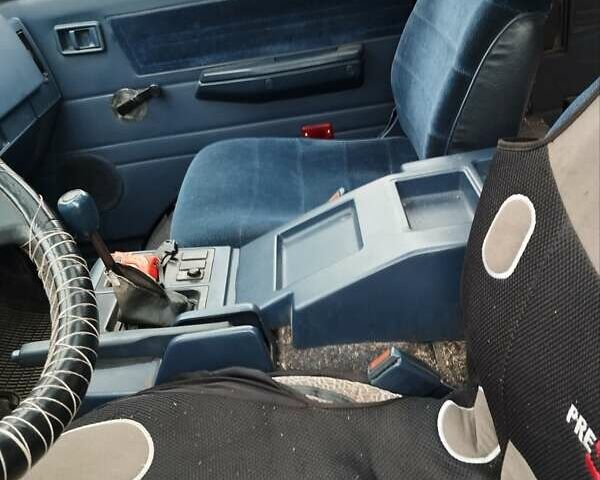 Синий Ниссан Ванетте, объемом двигателя 1.95 л и пробегом 300 тыс. км за 1600 $, фото 10 на Automoto.ua