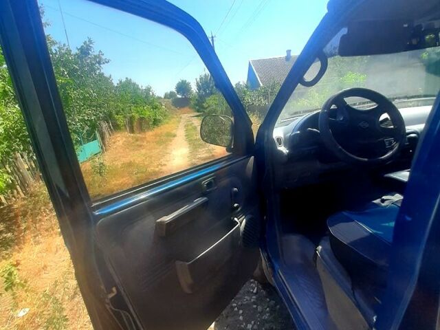 Синий Ниссан Ванетте, объемом двигателя 2.3 л и пробегом 220 тыс. км за 3000 $, фото 4 на Automoto.ua