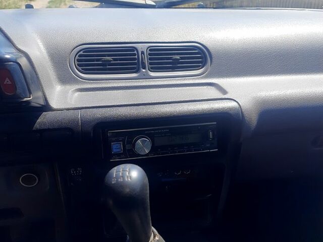 Синий Ниссан Ванетте, объемом двигателя 2.3 л и пробегом 220 тыс. км за 3000 $, фото 2 на Automoto.ua