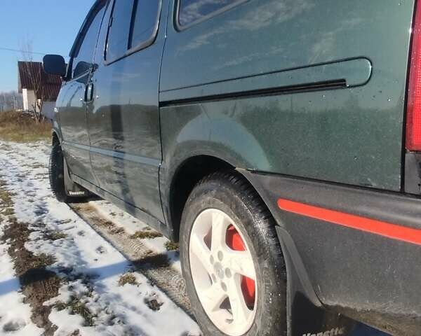 Зеленый Ниссан Ванетте, объемом двигателя 2.3 л и пробегом 260 тыс. км за 6000 $, фото 5 на Automoto.ua