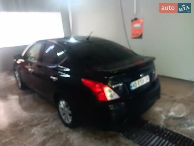 Черный Ниссан Верса, объемом двигателя 1.6 л и пробегом 80 тыс. км за 13000 $, фото 1 на Automoto.ua