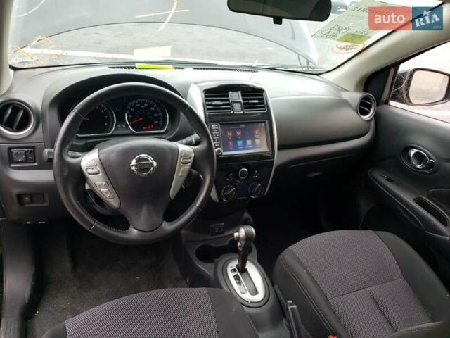 Черный Ниссан Верса, объемом двигателя 1.6 л и пробегом 80 тыс. км за 13000 $, фото 4 на Automoto.ua