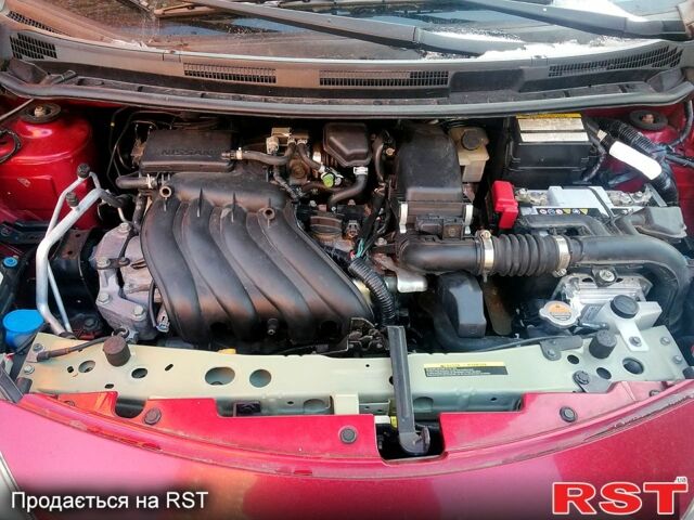 Красный Ниссан Верса, объемом двигателя 1.6 л и пробегом 170 тыс. км за 6600 $, фото 6 на Automoto.ua