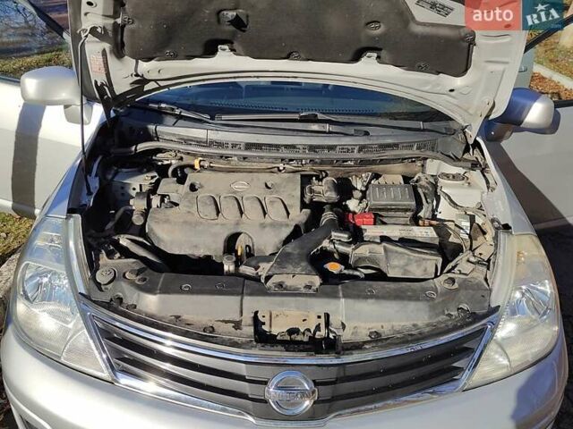 Сірий Ніссан Верса, об'ємом двигуна 1.8 л та пробігом 140 тис. км за 7100 $, фото 5 на Automoto.ua