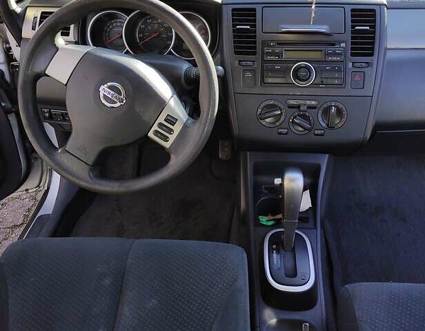 Сірий Ніссан Верса, об'ємом двигуна 1.8 л та пробігом 140 тис. км за 7100 $, фото 6 на Automoto.ua