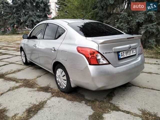 Серый Ниссан Верса, объемом двигателя 1.6 л и пробегом 120 тыс. км за 5999 $, фото 2 на Automoto.ua