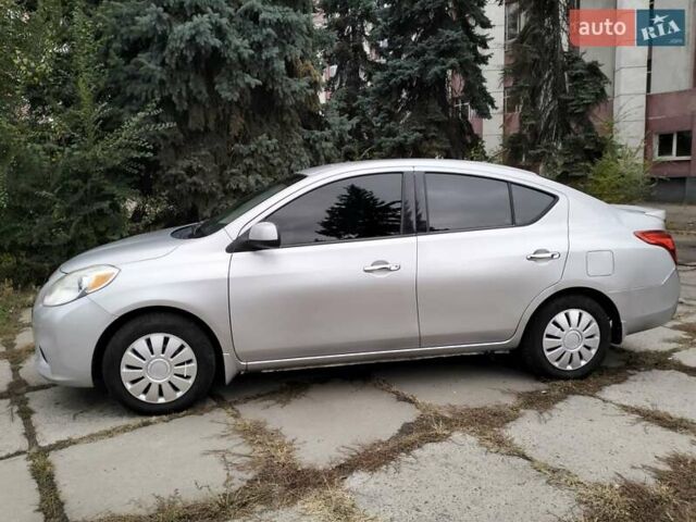 Серый Ниссан Верса, объемом двигателя 1.6 л и пробегом 120 тыс. км за 5999 $, фото 1 на Automoto.ua