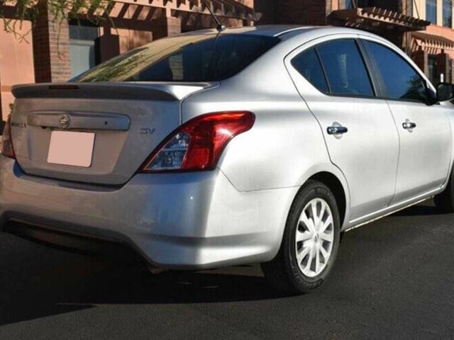 Серый Ниссан Верса, объемом двигателя 1.6 л и пробегом 55 тыс. км за 1900 $, фото 2 на Automoto.ua