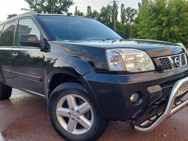 Черный Ниссан Икс-Терра, объемом двигателя 2.2 л и пробегом 270 тыс. км за 6000 $, фото 3 на Automoto.ua