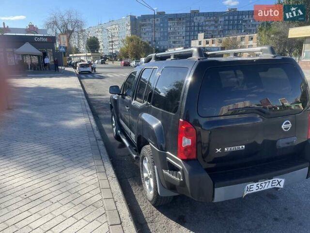 Черный Ниссан Икс-Терра, объемом двигателя 4 л и пробегом 330 тыс. км за 11500 $, фото 4 на Automoto.ua