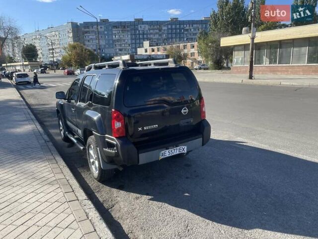 Черный Ниссан Икс-Терра, объемом двигателя 4 л и пробегом 330 тыс. км за 11500 $, фото 1 на Automoto.ua