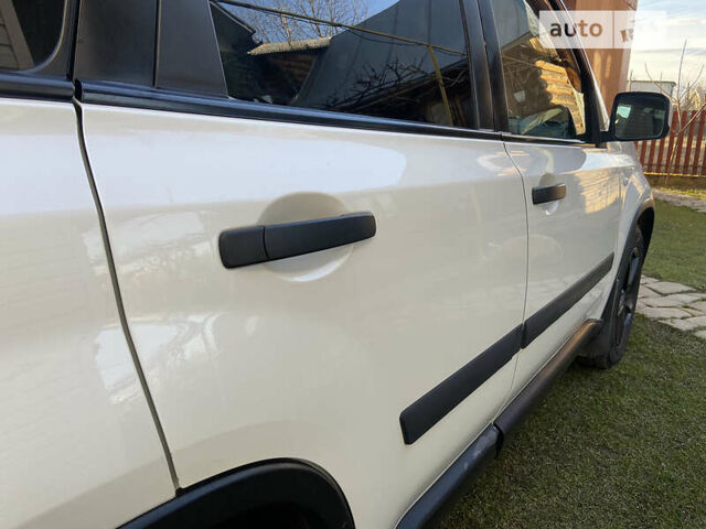 Білий Ніссан ІксТрейл, об'ємом двигуна 2 л та пробігом 203 тис. км за 11000 $, фото 7 на Automoto.ua