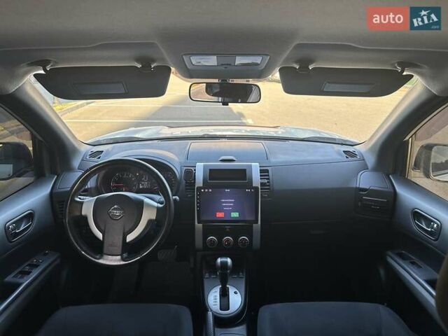 Белый Ниссан ИксТрейл, объемом двигателя 2 л и пробегом 100 тыс. км за 10800 $, фото 5 на Automoto.ua