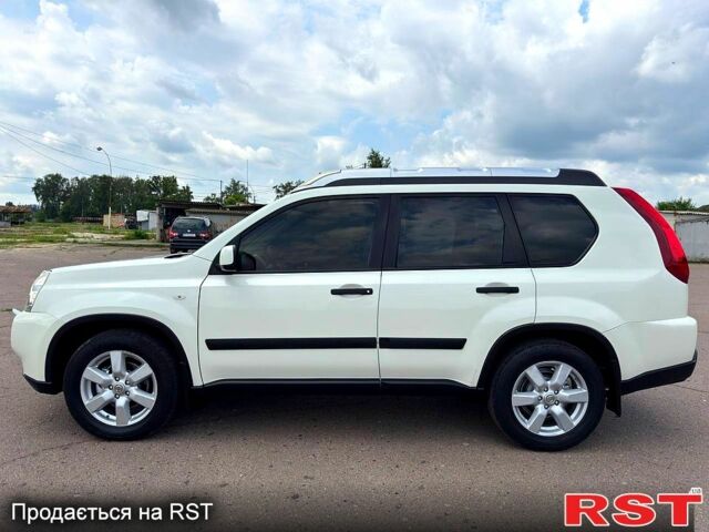 Белый Ниссан ИксТрейл, объемом двигателя 2 л и пробегом 147 тыс. км за 11200 $, фото 2 на Automoto.ua