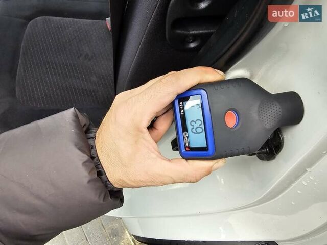 Белый Ниссан ИксТрейл, объемом двигателя 2 л и пробегом 205 тыс. км за 11599 $, фото 69 на Automoto.ua