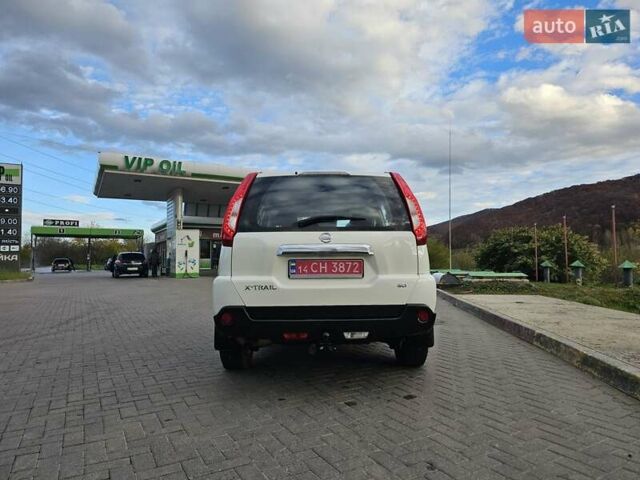 Белый Ниссан ИксТрейл, объемом двигателя 2 л и пробегом 205 тыс. км за 11599 $, фото 24 на Automoto.ua