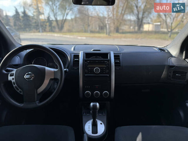 Белый Ниссан ИксТрейл, объемом двигателя 2 л и пробегом 205 тыс. км за 10300 $, фото 6 на Automoto.ua