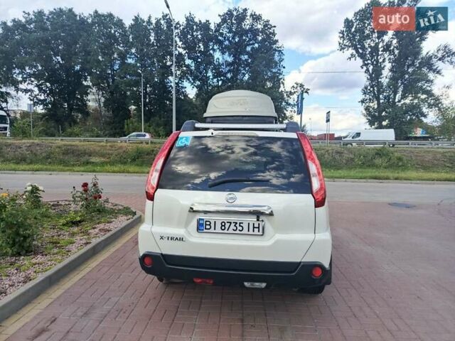 Белый Ниссан ИксТрейл, объемом двигателя 2 л и пробегом 220 тыс. км за 11500 $, фото 4 на Automoto.ua
